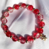 Red, Transparent and Golden Bracelet with Star Charm